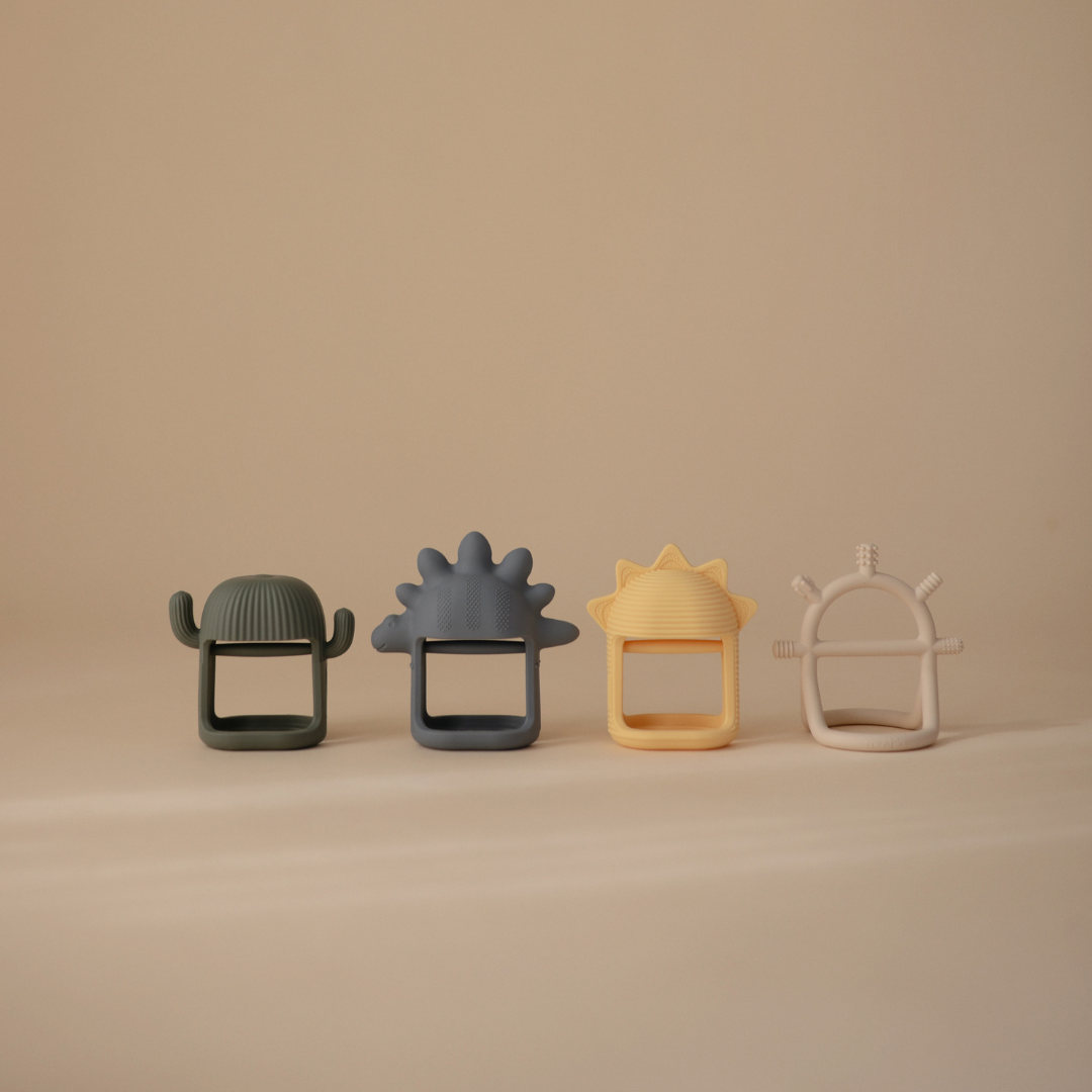 Kézre húzható rágóka - dinó