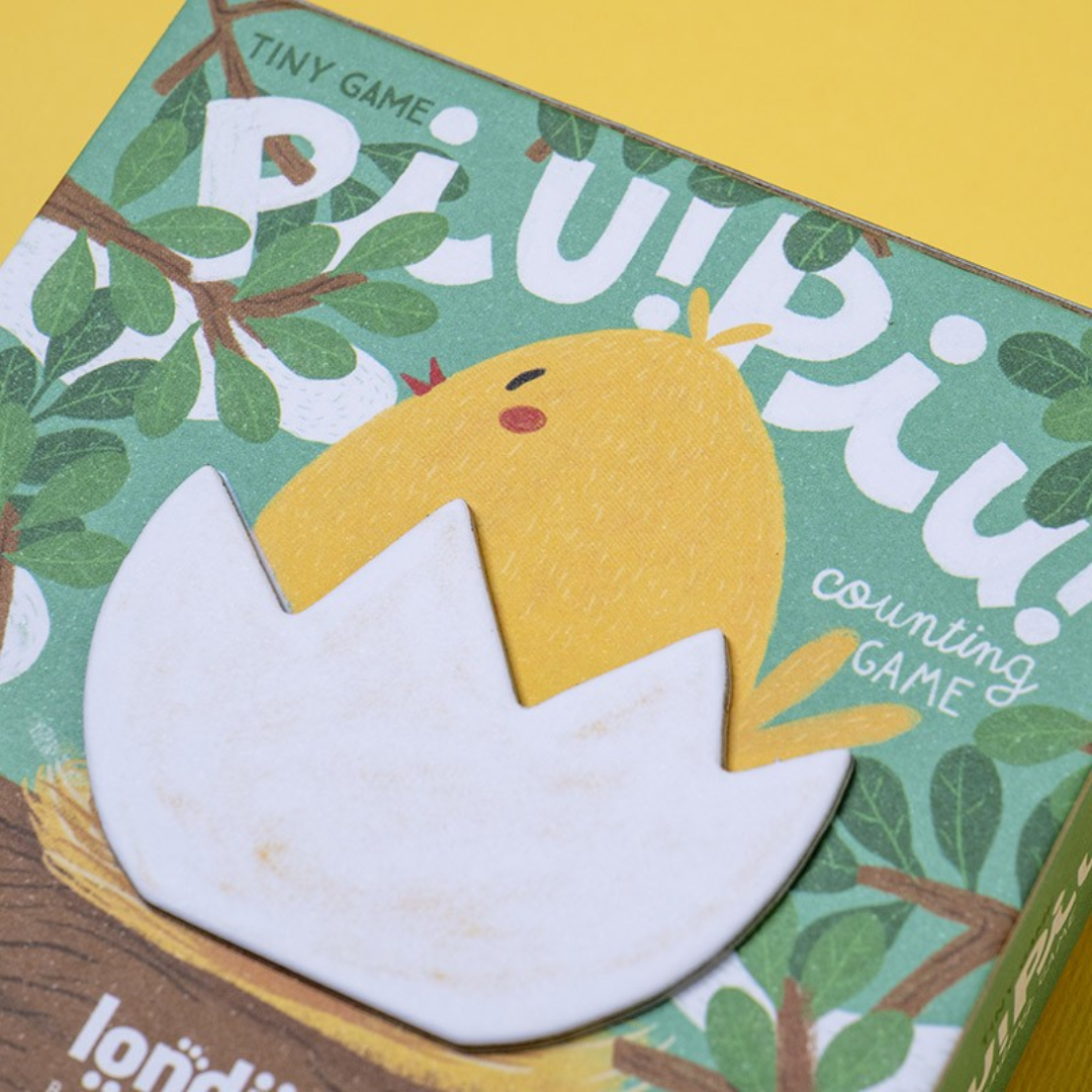 Londji Csip, csip mini társasjáték dobozának illusztrációja – kiscsibe a tojásban