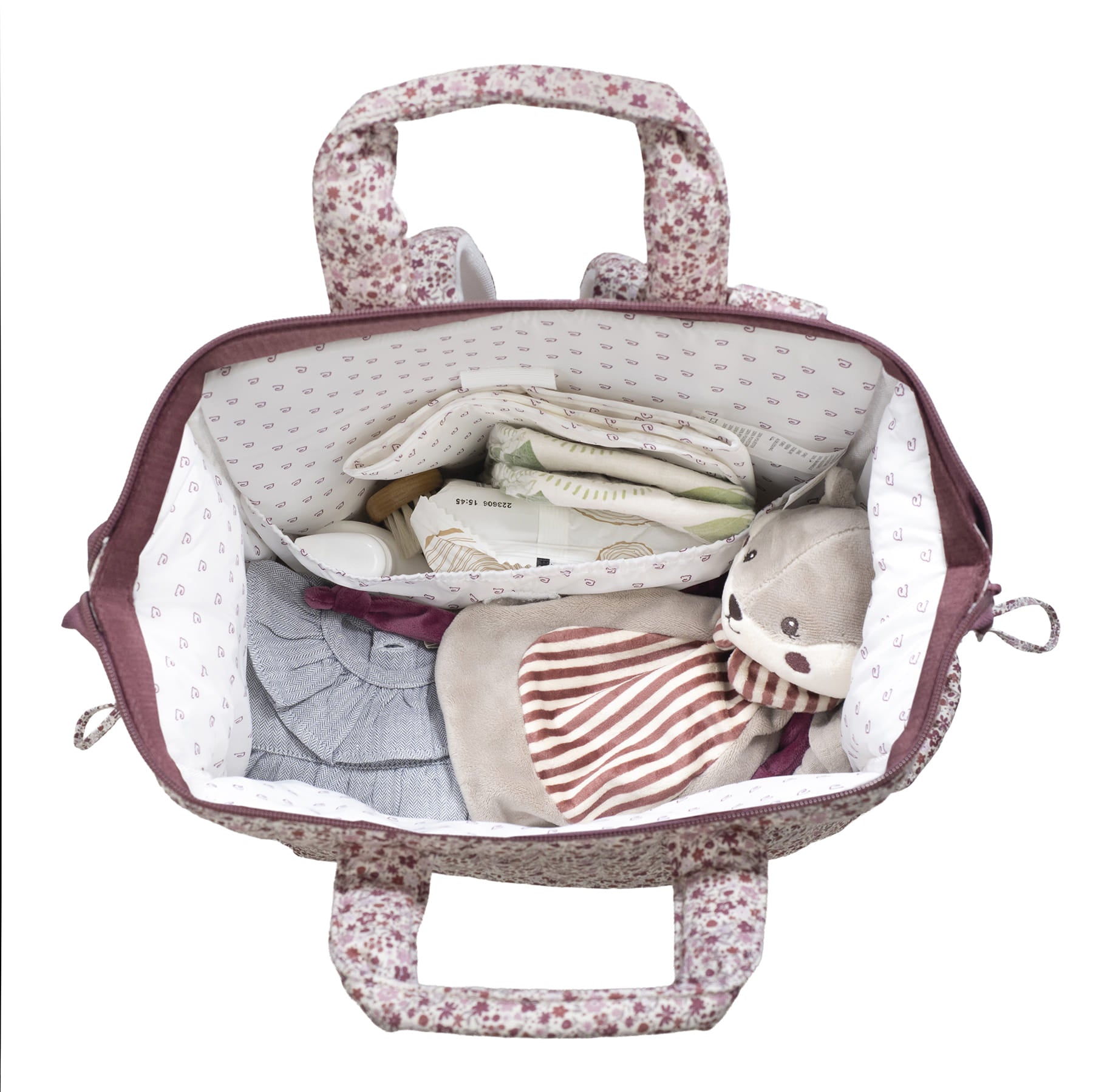 Pelenkázó táska virág mintával, nagy belső térrel, sok pakolható zsebbel bepakolt állapotban - Cherry