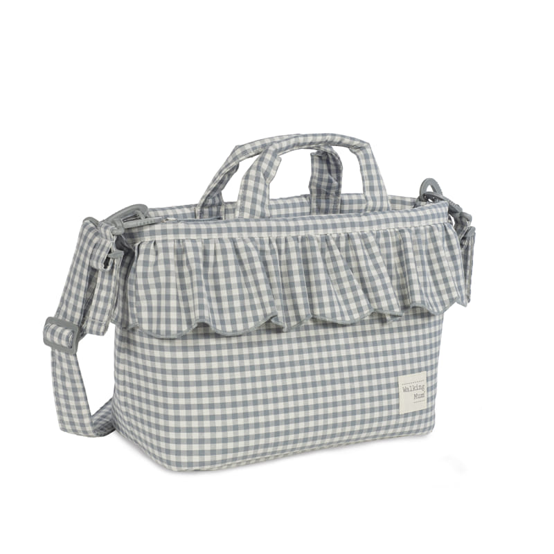 A táska tartozékai: hosszú vállpánt és lecsatolható babakocsi pántok karabinerrel