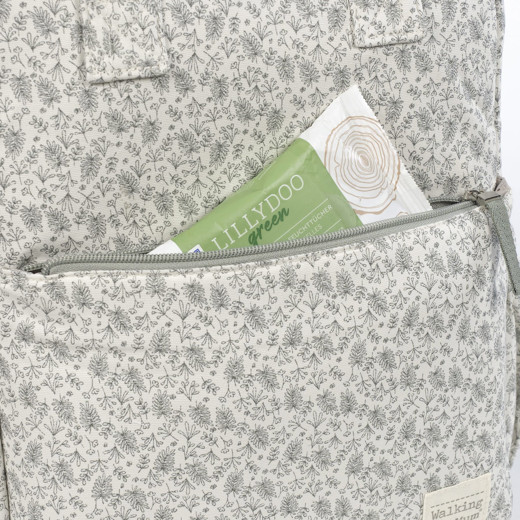 Csíkos zsebekkel biztonságosan pakolható pelenkázó hátizsák menta virágos mintával