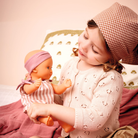 Djeco fürdethető és alvós játékbaba Szilva - ruhával és alsóneművel