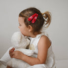 Lanika Aterlier karácsonyi hópehely mintás piros hajcsat - 2 db egy csomagban