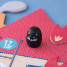 Megmentésre váró kiscica a Mentsd meg a cicát! kooperatív társasjátékban