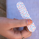 Namaki gyerek körömlakk szetthez járó pöttyös körömreszelő 