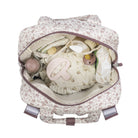 Átláthatóan pakolható pelenkázó hátizsák virágos mintával, rózsaszín árnyalatban