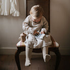 Mushie pukkasztós játék telefon - szellő